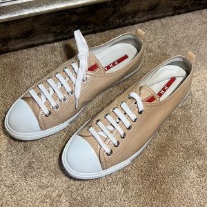 PRADA Sport Patent Leather Nude Cipria Lace Up Sneakers. TV $500